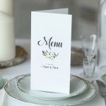 Karta menu lub harmonogram z zielonym motywem kwiatowym