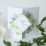 Zaproszenie ślubne  z motywem delikatnych niebieskich kwiatów