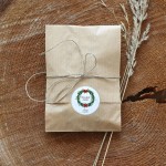 Naklejki  z logo z grafiką ozdobnego świątecznego wieńca