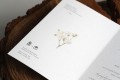 Zaproszenia ślubne z gałązką gipsówki