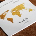 Zaproszenie ślubne drukowane z motywem złotej mapy świata