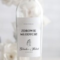 Weselne naklejki na butelkę z rysunkową Parą Młodą