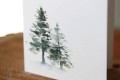 Kartka firmowa bożonarodzeniowa/noworoczna drukowana 12x17 z motywem choinek malowanych akwarelą