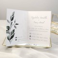 Zaproszenia ślubne drukowane z zielonym motywem liściastym