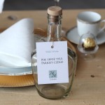 Zestaw 18 zawieszek na alkohol z kolekcji Champagne z napisem w kolorze butelkowej zieleni