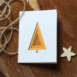 Świąteczne kartki firmowe z minimalistyczną żółtą choinką - 12x17 cm