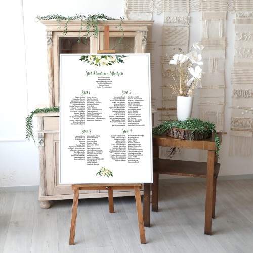 Elegancki duży plan stołów weselnych z zielonymi kwiatami