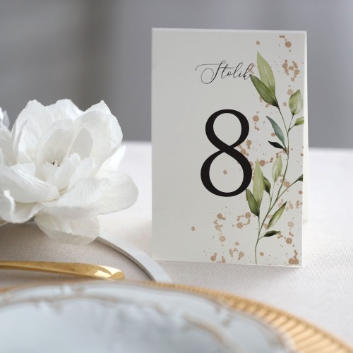 Numerek na stół stojący z listkami ze złotem