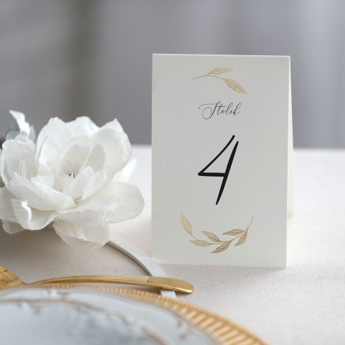 Numerek na stół stojący ze złotymi gałązkami